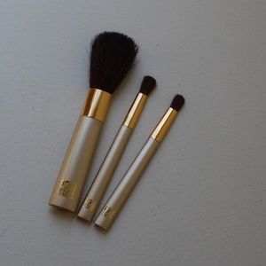 Estee Lauder 3 pc gold toned makeup brush set NWOT